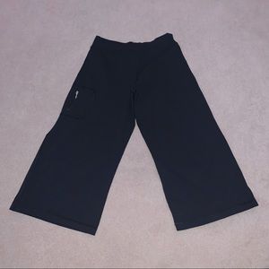 One Tooth Black Capris